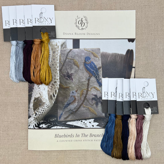 Diana Bloom Designs - Bluebirds In The Branches - Chart and/or Roxy Floss